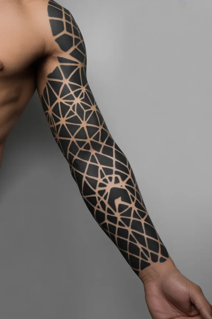 Blackout geometric sleeve tattoo
