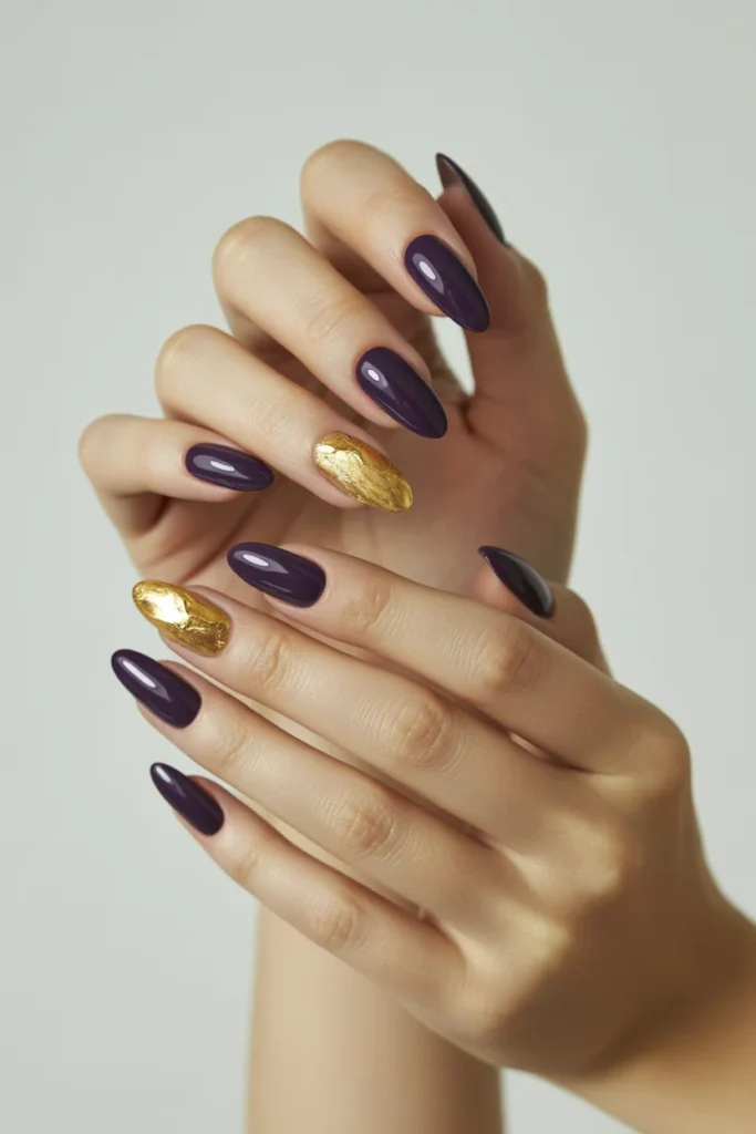 Deep purple gold leaf nails