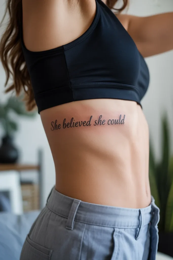 Script side stomach tattoo