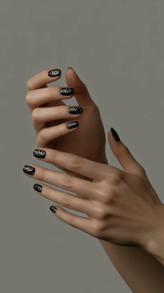 Black and silver swirl nails