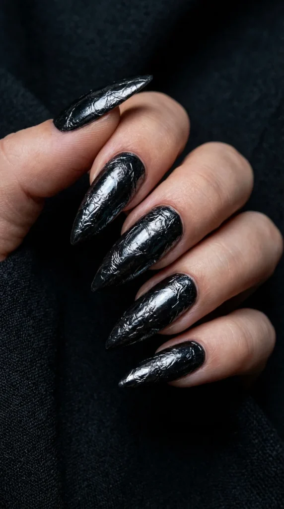 Black foil stiletto nails