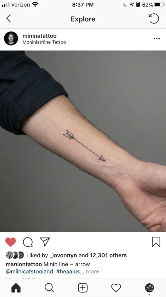 fine line arrow forearm tattoo men