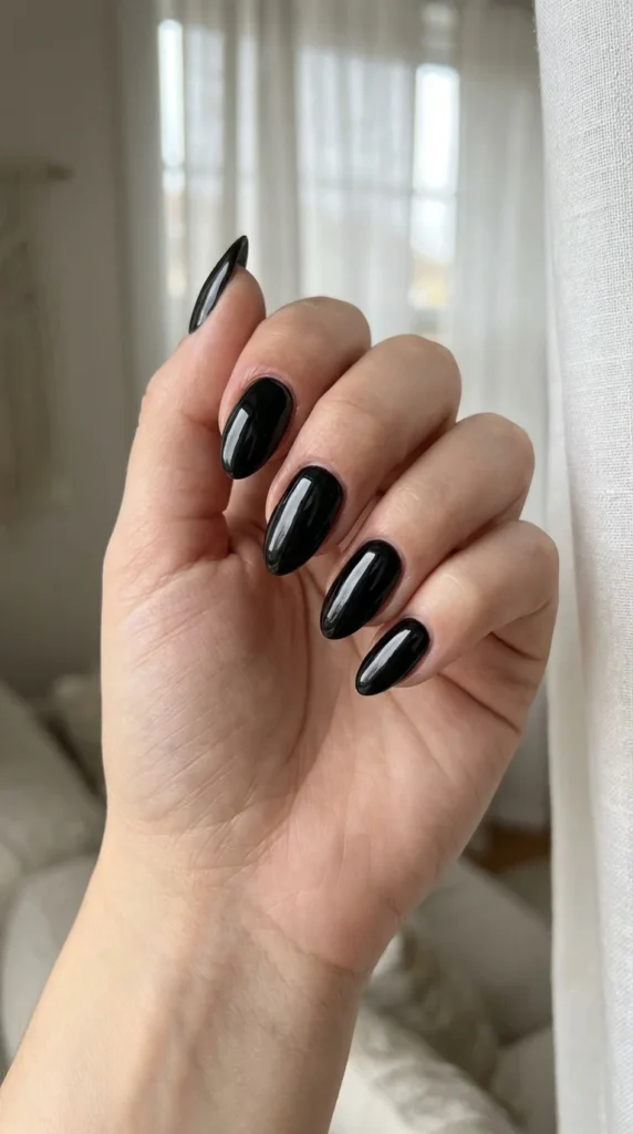 glossy black almond nails