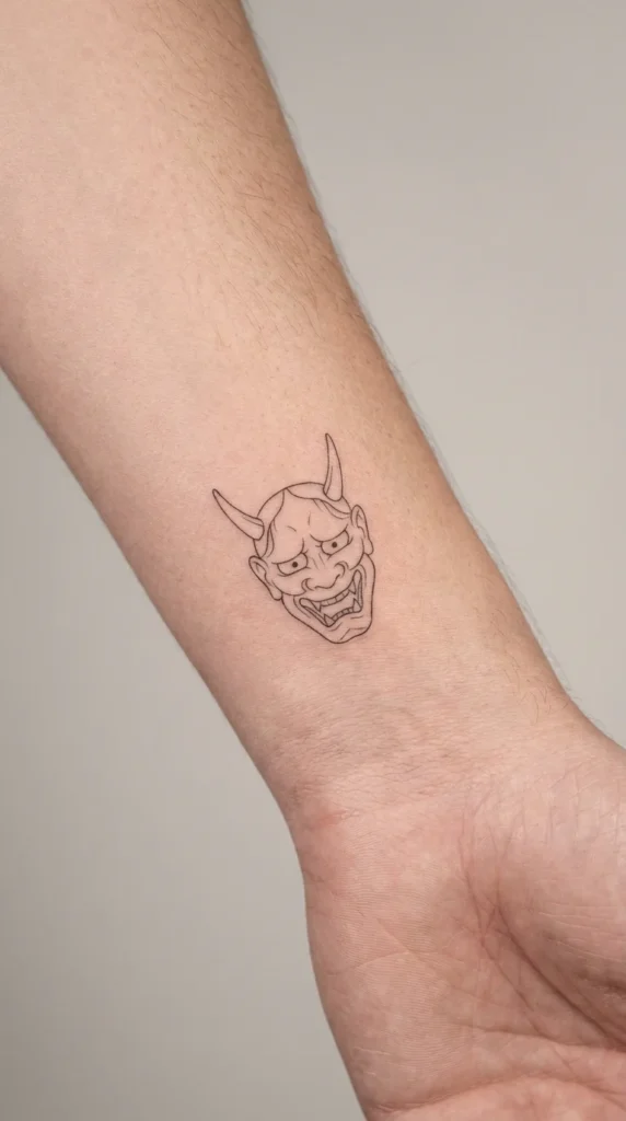 minimalist oni demon dark tattoo wrist